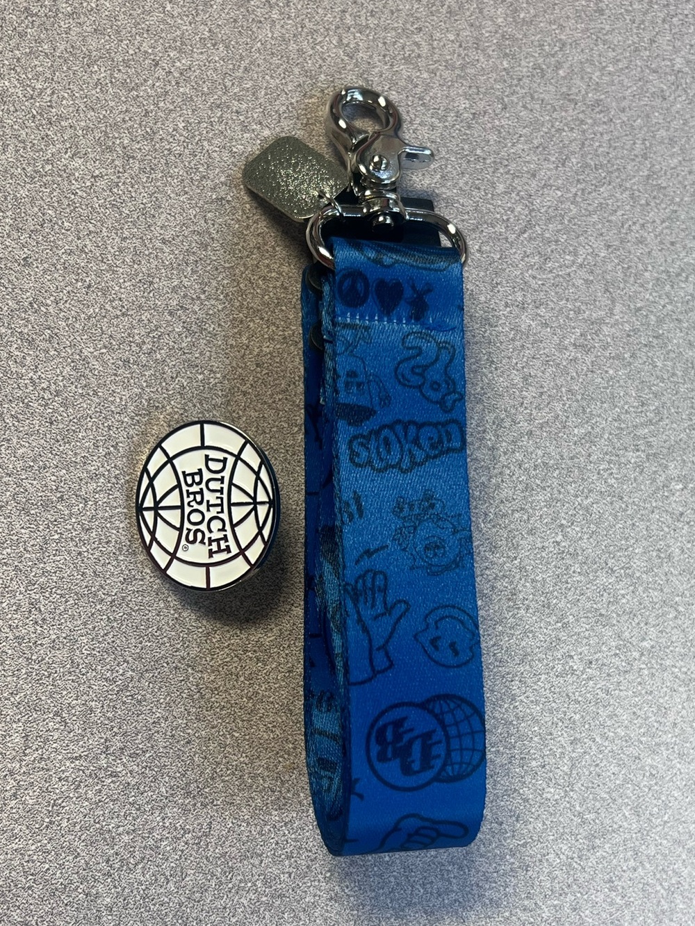 Dutch Bros blue lanyard and pin set
